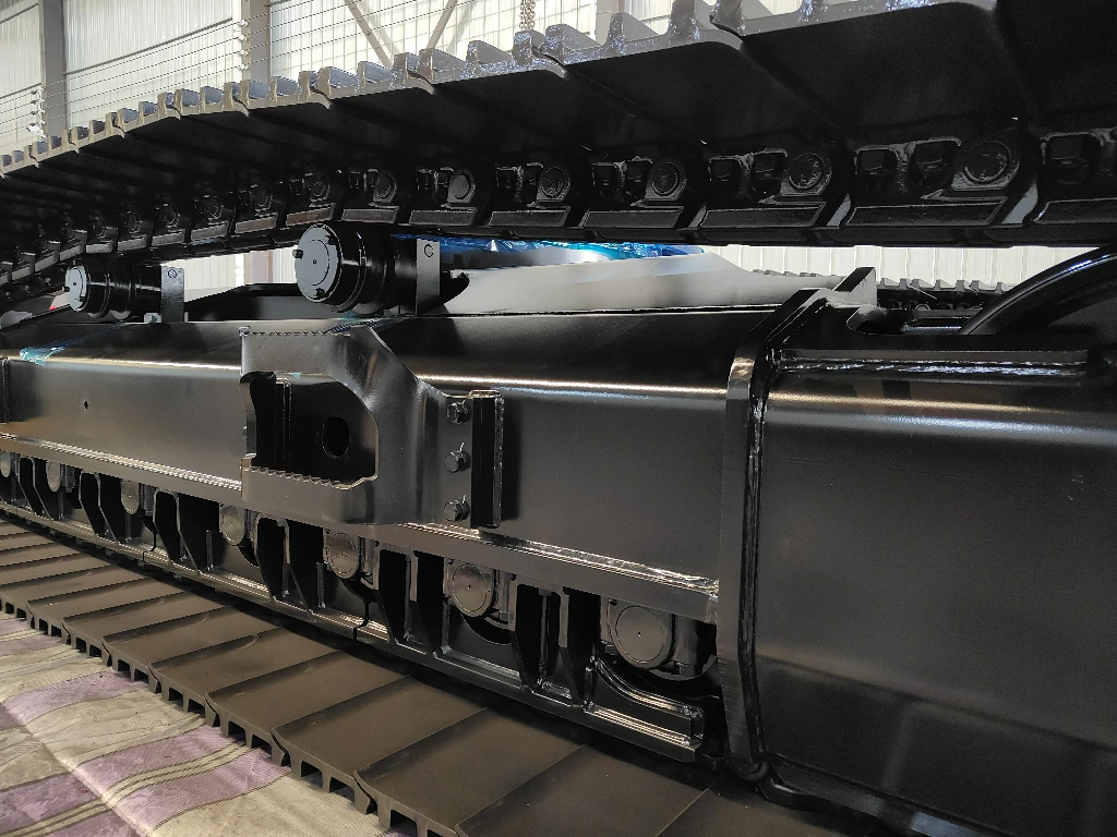 Steel track undercarriage side beam showing track rollers, track chain and welded Q345B frame